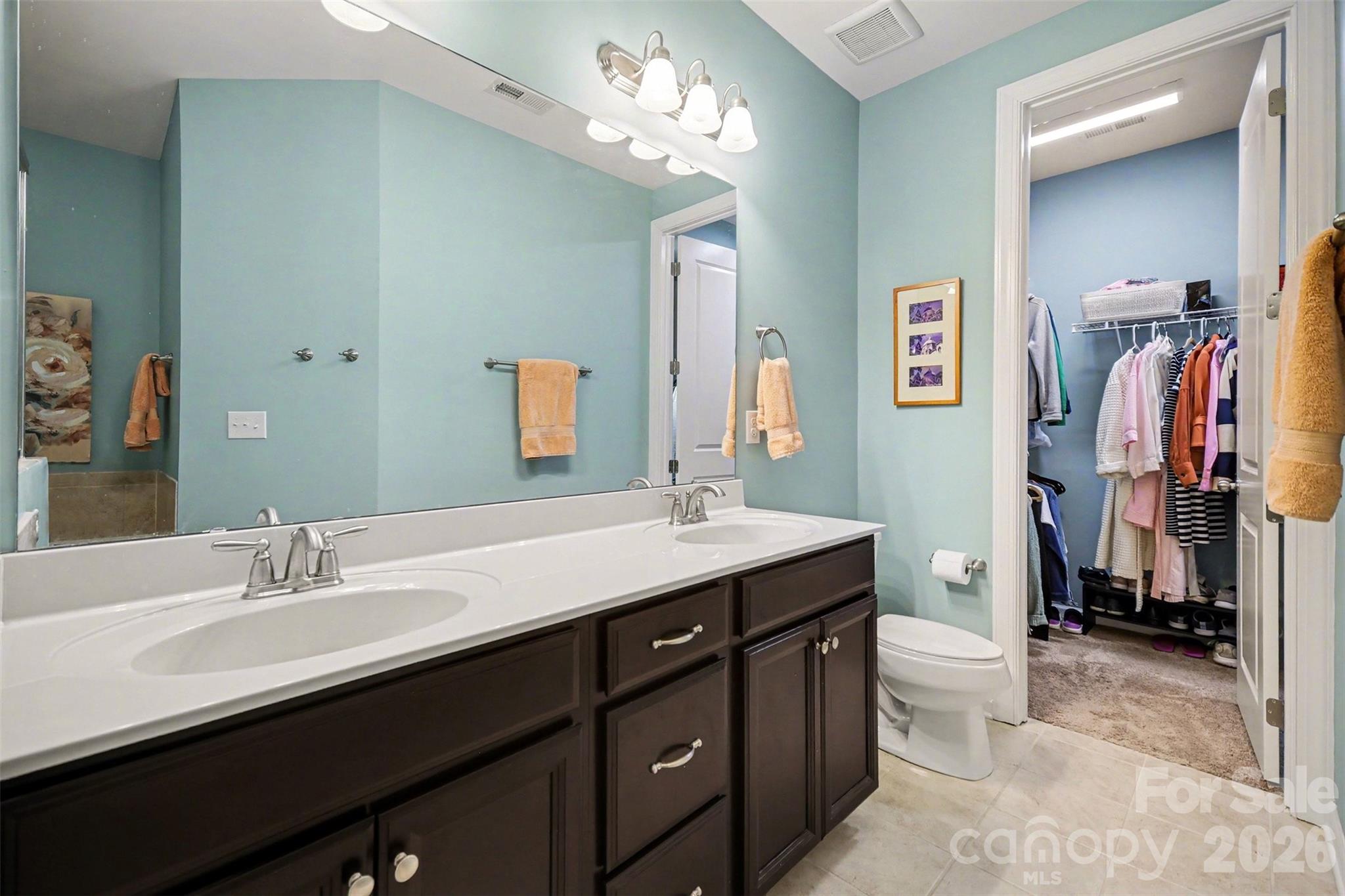 1008 Archibald Avenue Fort Mill, SC 29708 - Photo 30 of 43 a bathroom with a double vanity sink a and a mirror