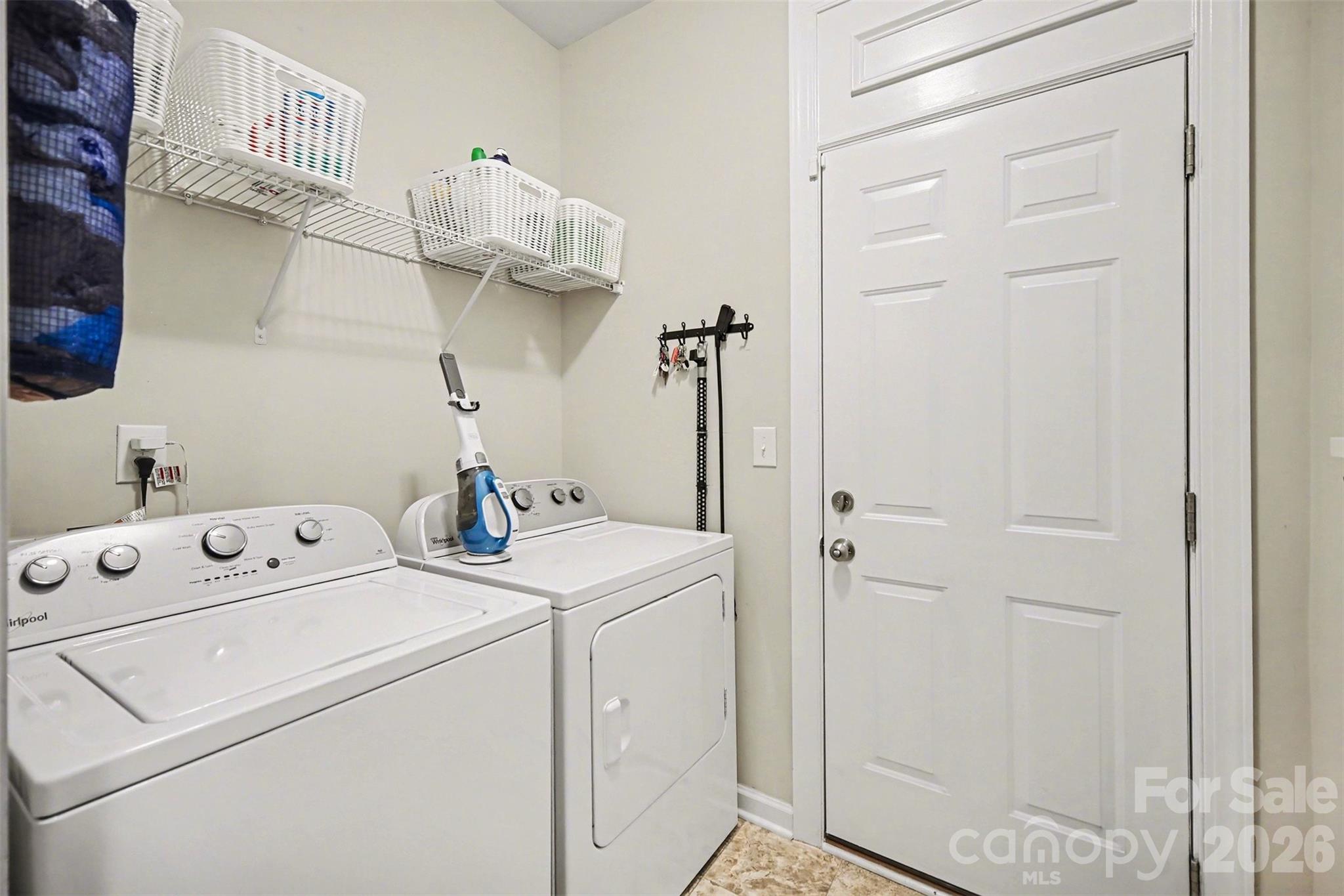 1008 Archibald Avenue Fort Mill, SC 29708 - Photo 36 of 43 a view of storage and utility room with washer and dryer