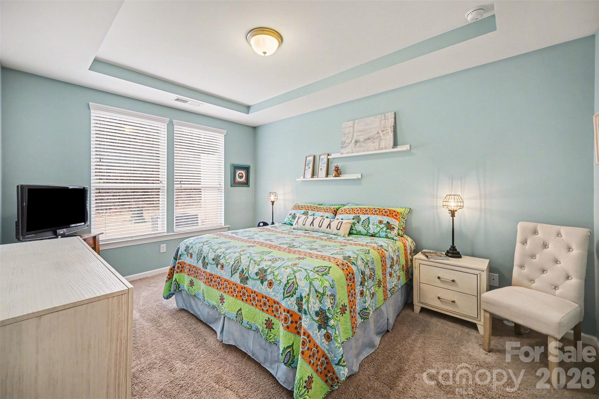 1008 Archibald Avenue Fort Mill, SC 29708 - Photo 5 of 43 a bedroom with a bed and a couch
