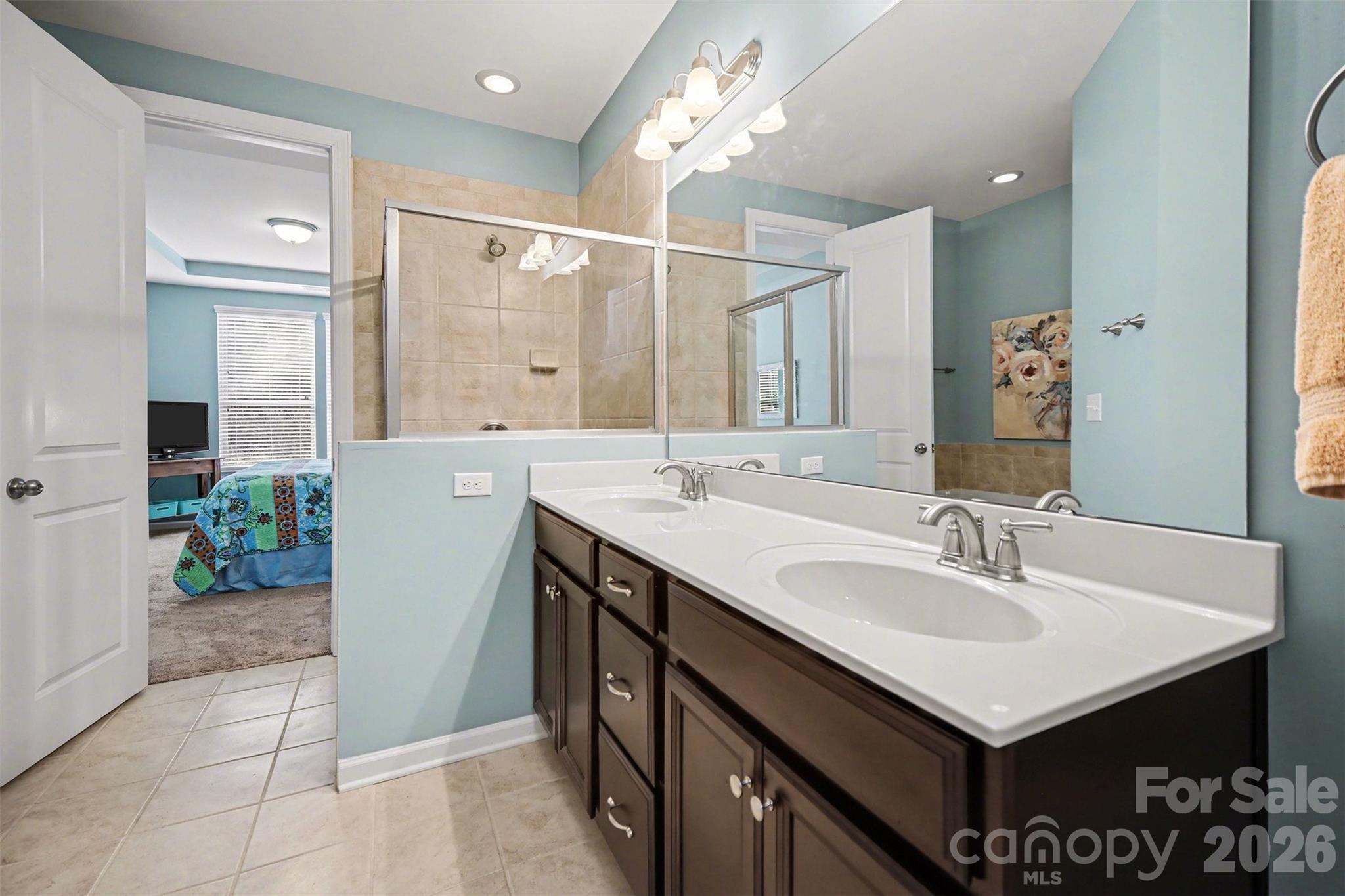 1008 Archibald Avenue Fort Mill, SC 29708 - Photo 6 of 43 a bathroom with a sink and a mirror