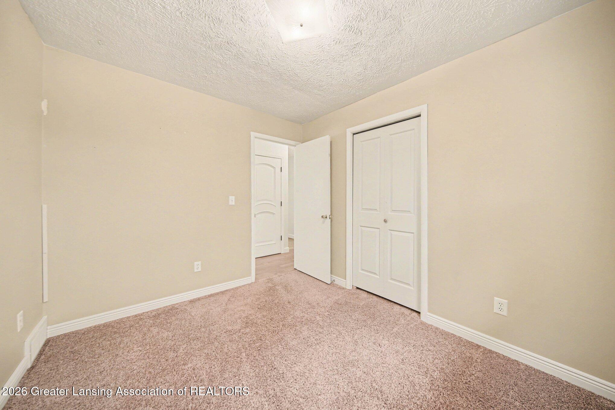2898 North Every Road Mason, MI 48854 - Photo 36 of 44 bedroom 3
