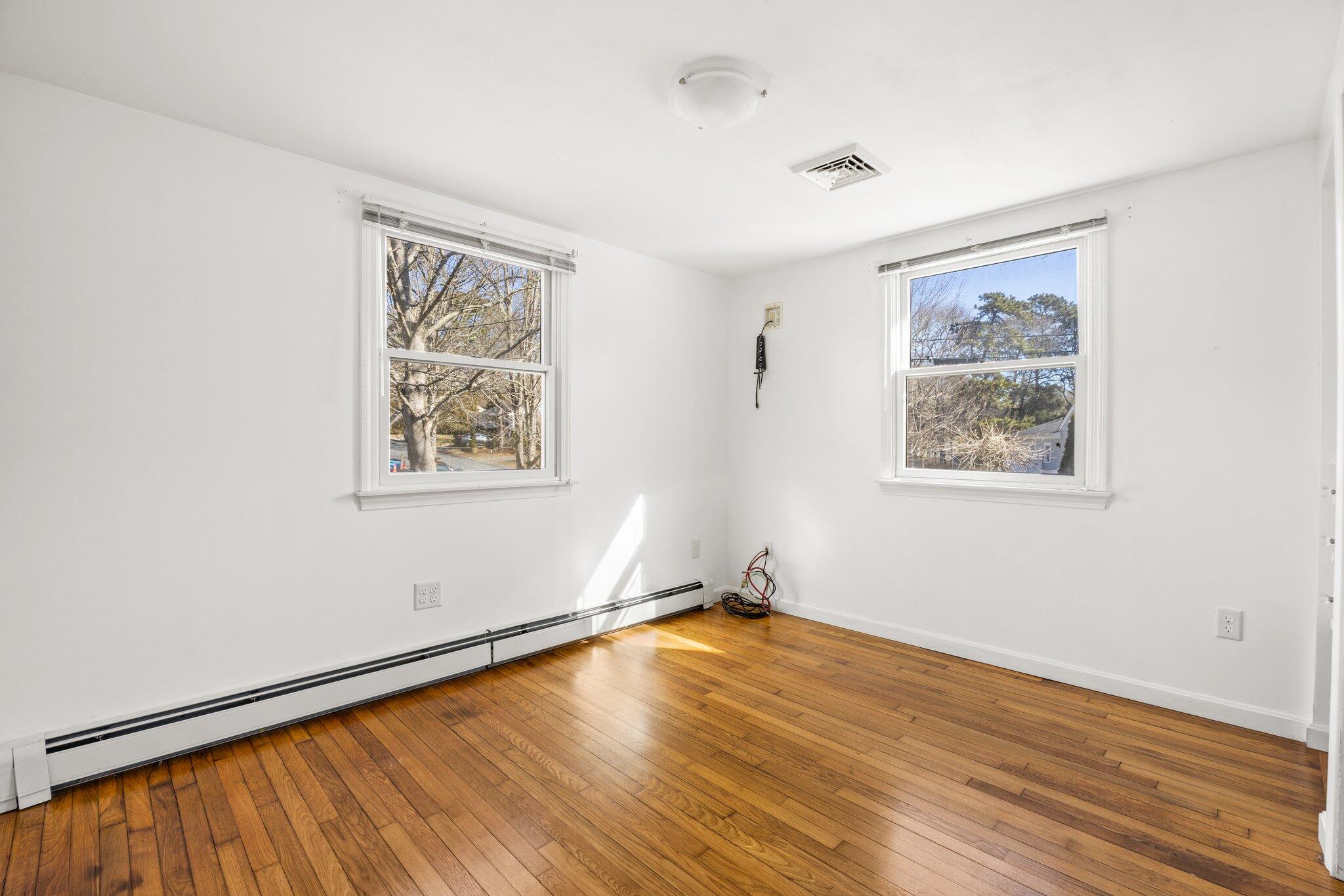5 Signe Road Dennis, MA 02638 - Photo 17 of 39 a view of a room with wooden floor and window