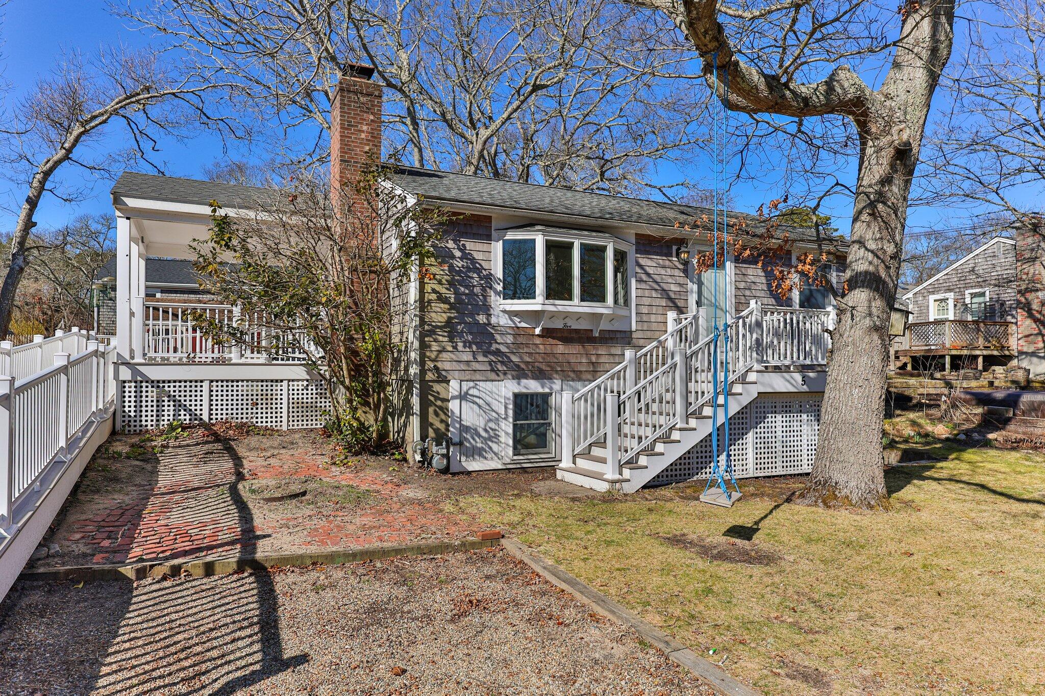5 Signe Road Dennis, MA 02638 - Photo 2 of 39 a view of a house with a yard