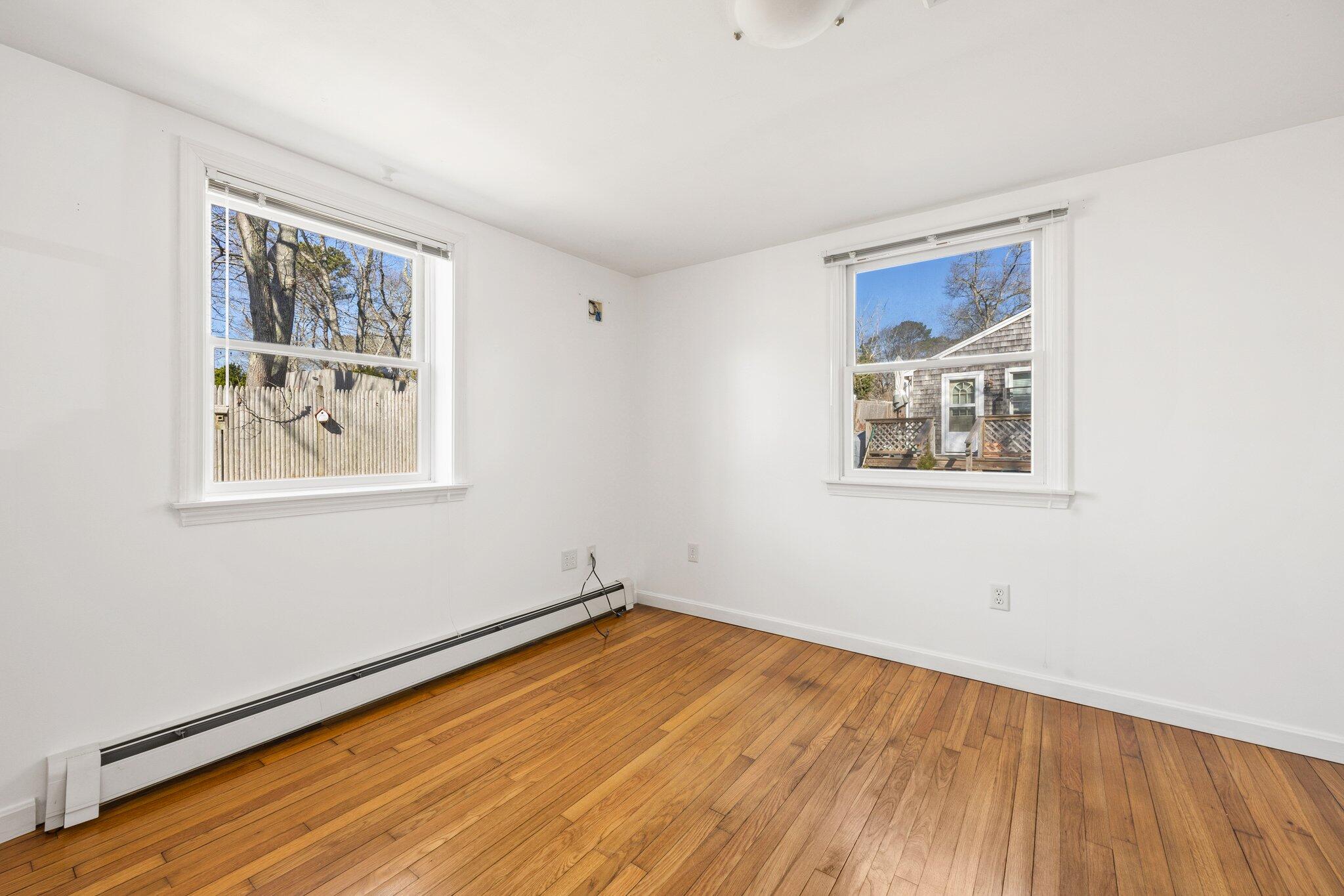 5 Signe Road Dennis, MA 02638 - Photo 21 of 39 a view of a room with wooden floor and window