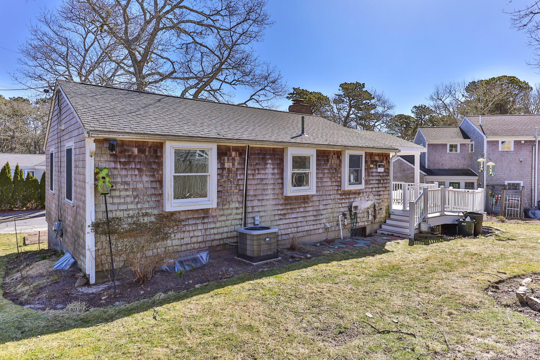 5 Signe Road Dennis, MA 02638 - Photo 29 of 39 a view of a house with a yard