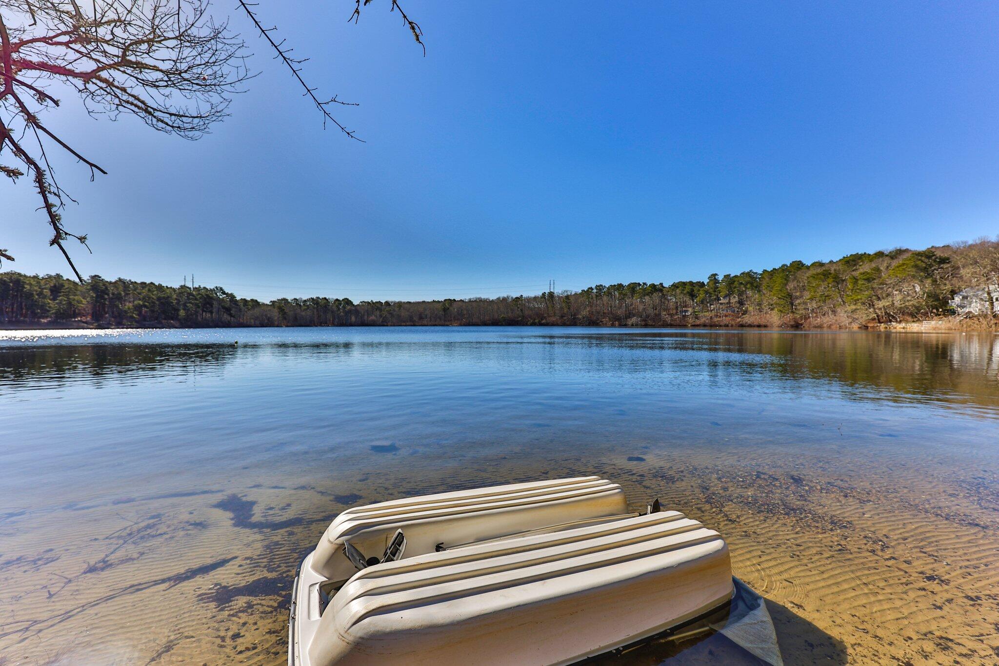 5 Signe Road Dennis, MA 02638 - Photo 35 of 39 a view of a lake with mountain in the background