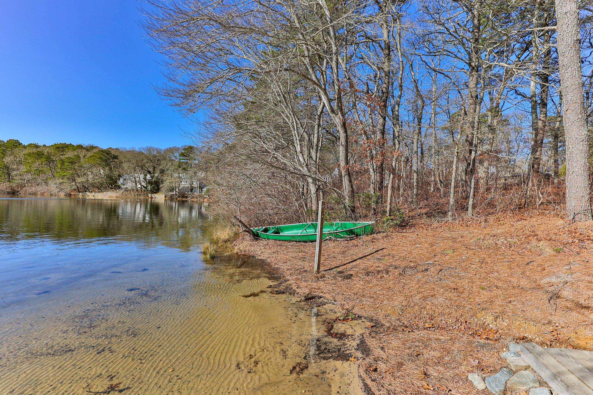 5 Signe Road Dennis, MA 02638 - Photo 36 of 39 a view of a lake with a yard