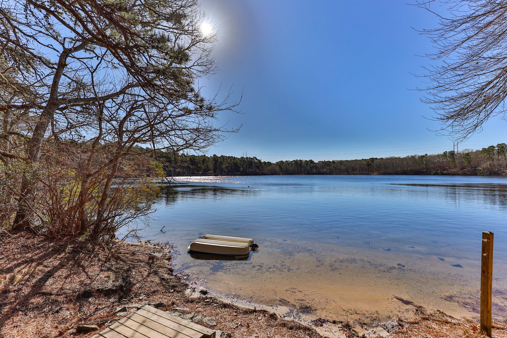 5 Signe Road Dennis, MA 02638 - Photo 6 of 39 a view of a lake with houses