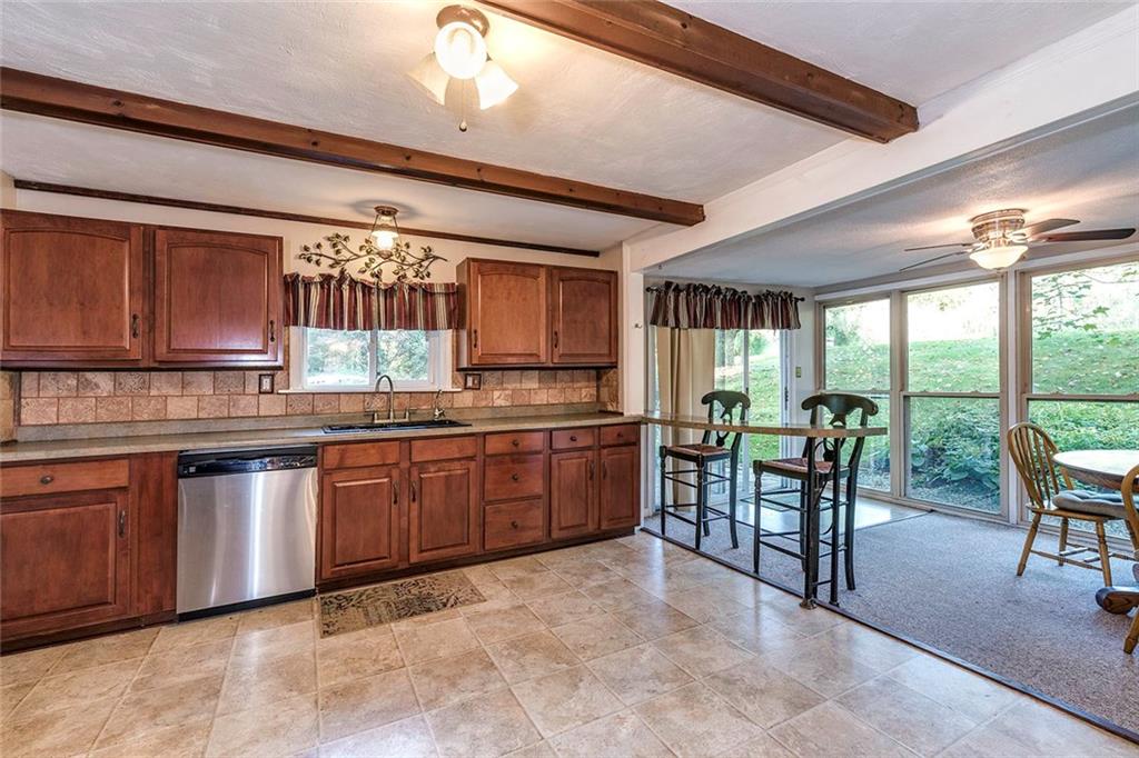 288 Linnwood Road Eighty Four, PA 15330 - Photo 12 of 25 Large Eat In Kitchen- Open to Sunroom!