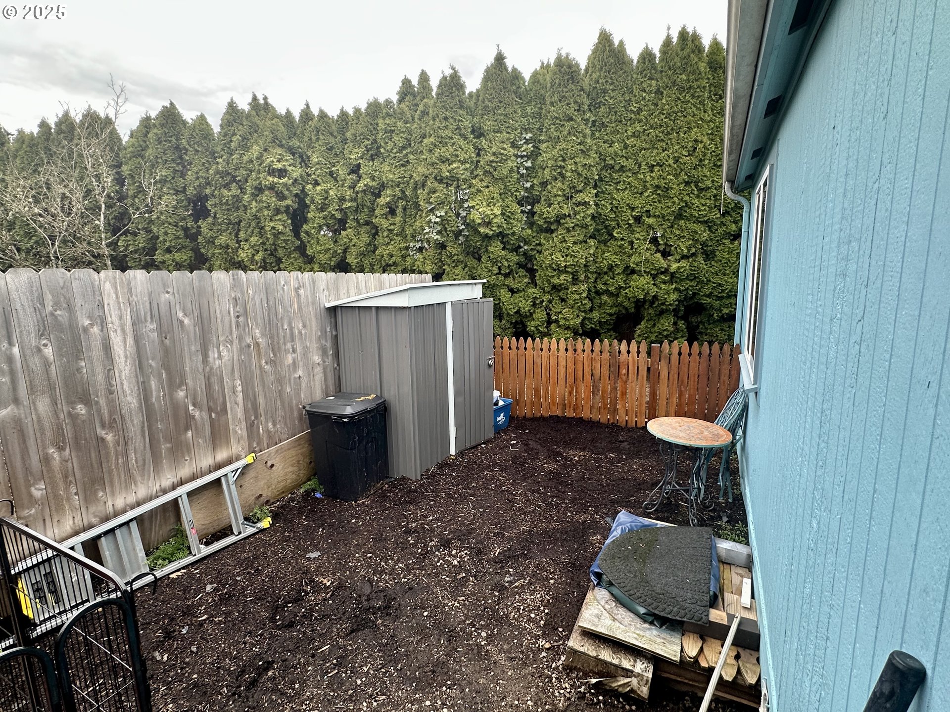 5510 E Street Springfield, OR 97478 - Photo 12 of 21 a view of a chair and table in the backyard