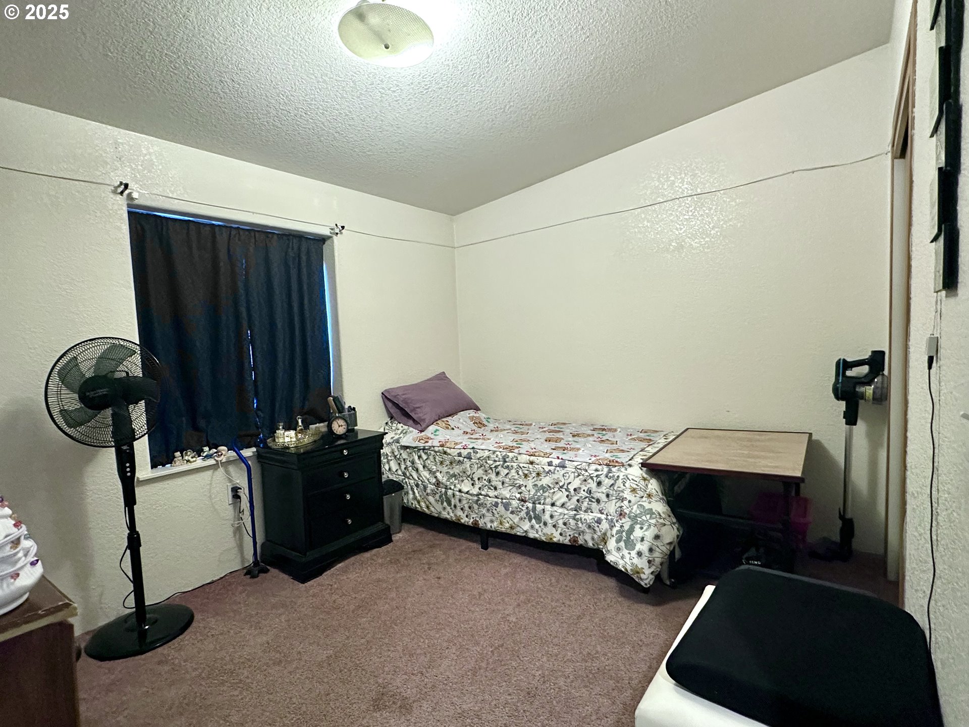 5510 E Street Springfield, OR 97478 - Photo 9 of 21 a bedroom with a bed and cabinets