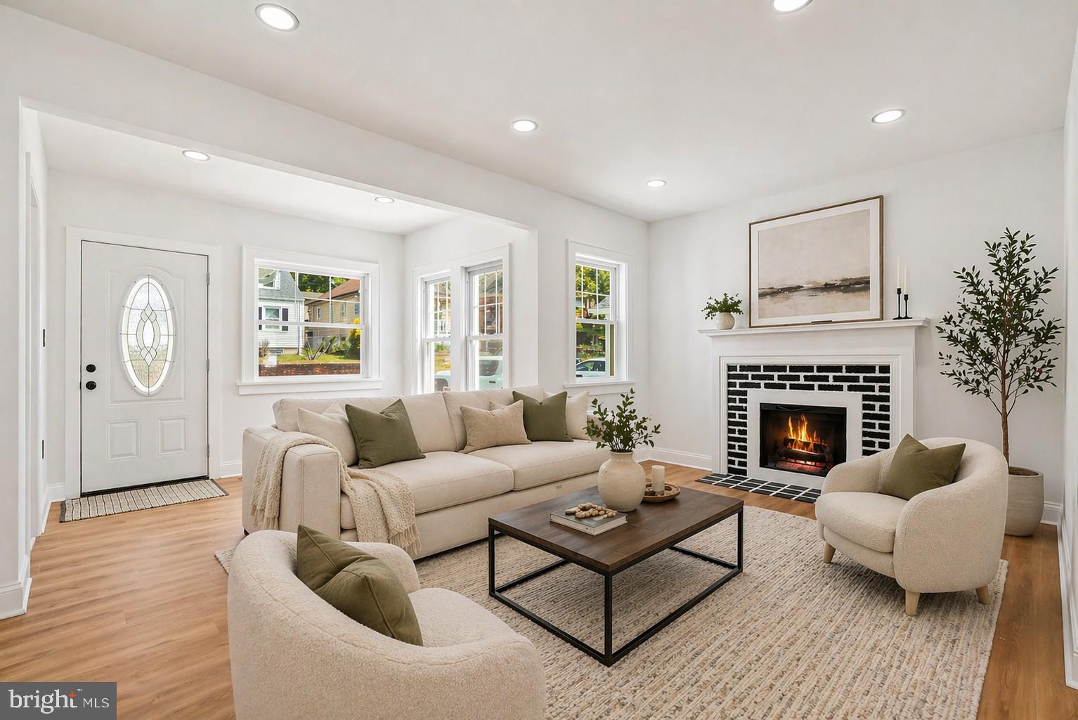 5309 Chesapeake Road Hyattsville, MD 20781 - Photo 1 of 36 a living room with furniture and a fireplace
