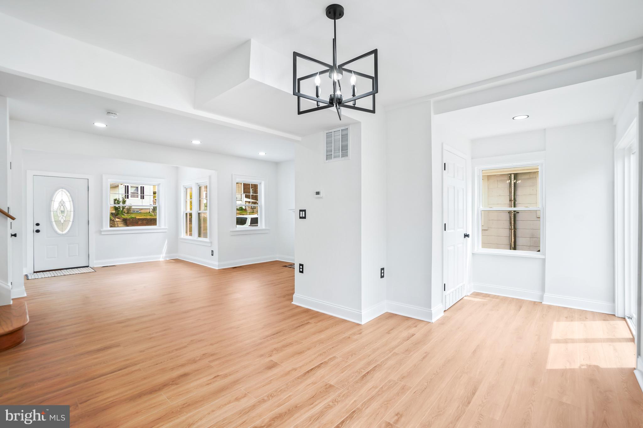 5309 Chesapeake Road Hyattsville, MD 20781 - Photo 17 of 36 a view of a room with wooden floor and windows