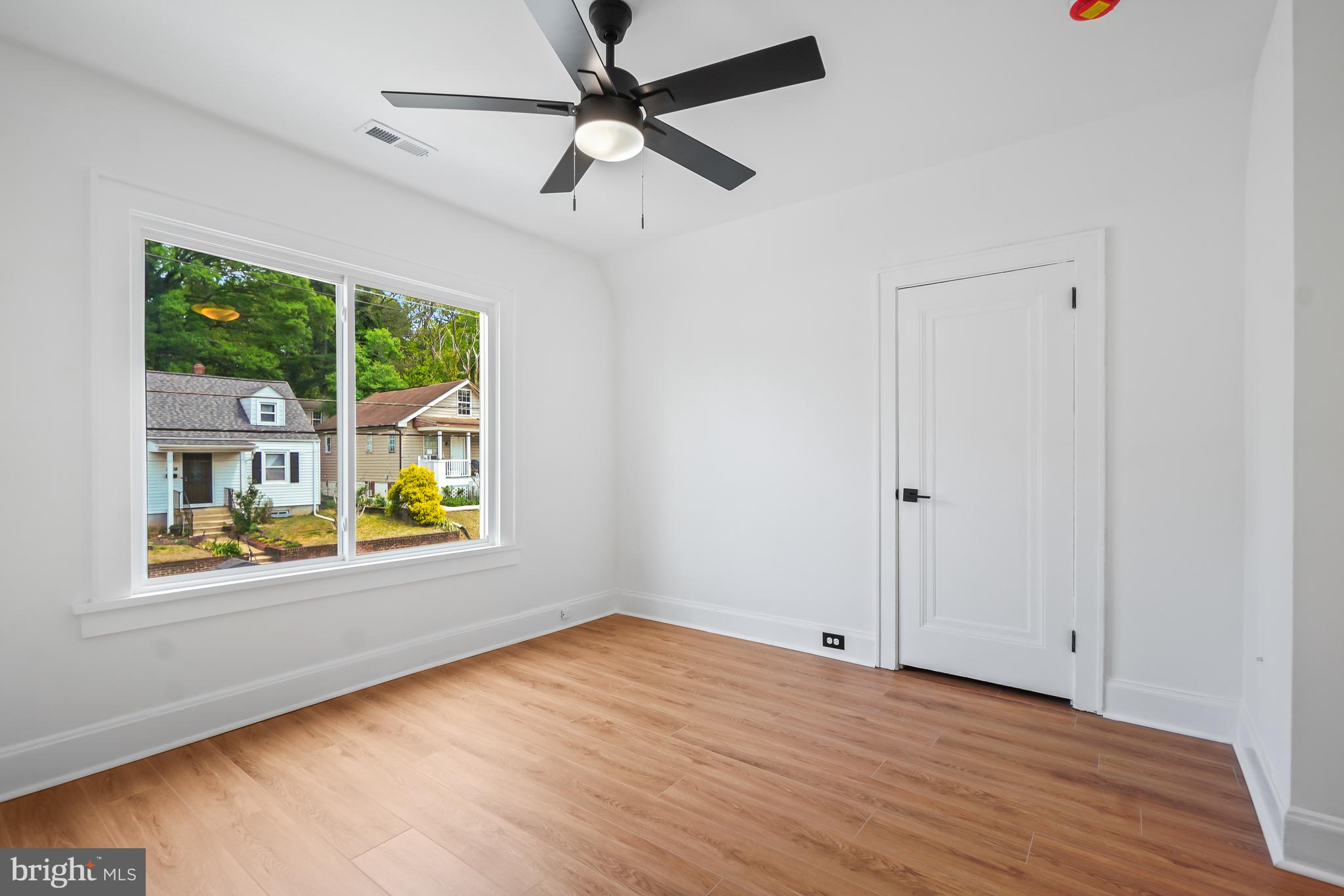 5309 Chesapeake Road Hyattsville, MD 20781 - Photo 25 of 36 a view of an empty room and a window