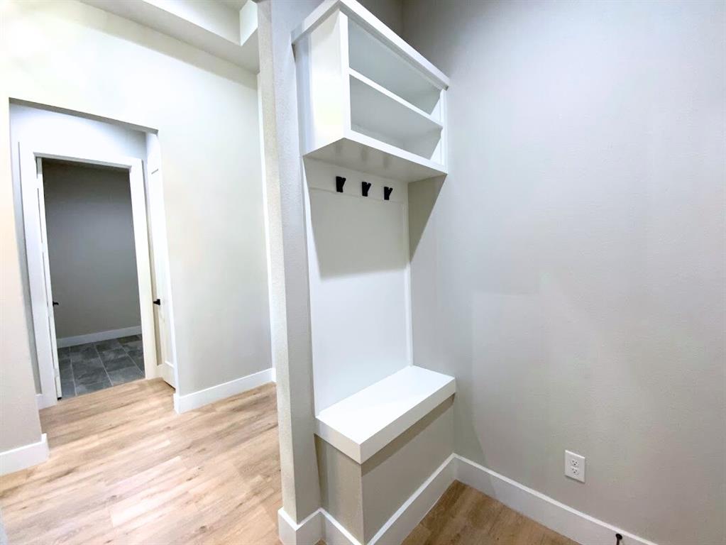 2770 Moffatt Avenue Dallas, TX 75216 - Photo 20 of 25 a view of an entryway with wooden floor