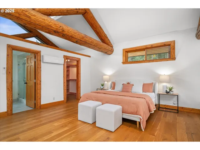 a bathroom with a granite countertop sink toilet a mirror a vanity and shower