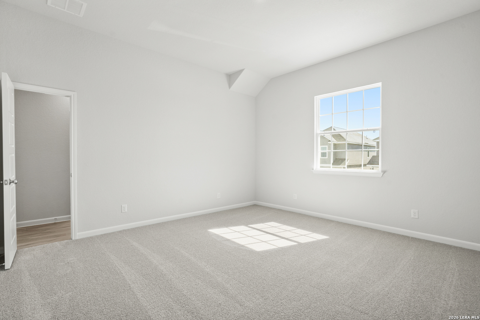 11111 Luckenbach Loop Converse, TX 78109 - Photo 21 of 27 an empty room with a window