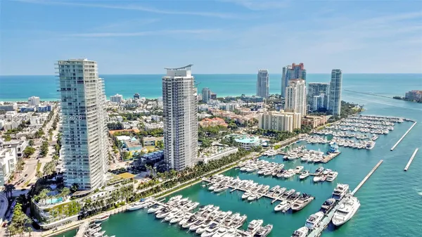 a view of a city with ocean