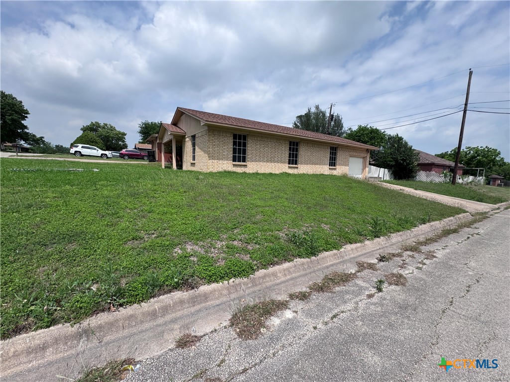 1301 North 10th Street Temple, TX 76501 - Photo 25 of 25 a house view with a garden space