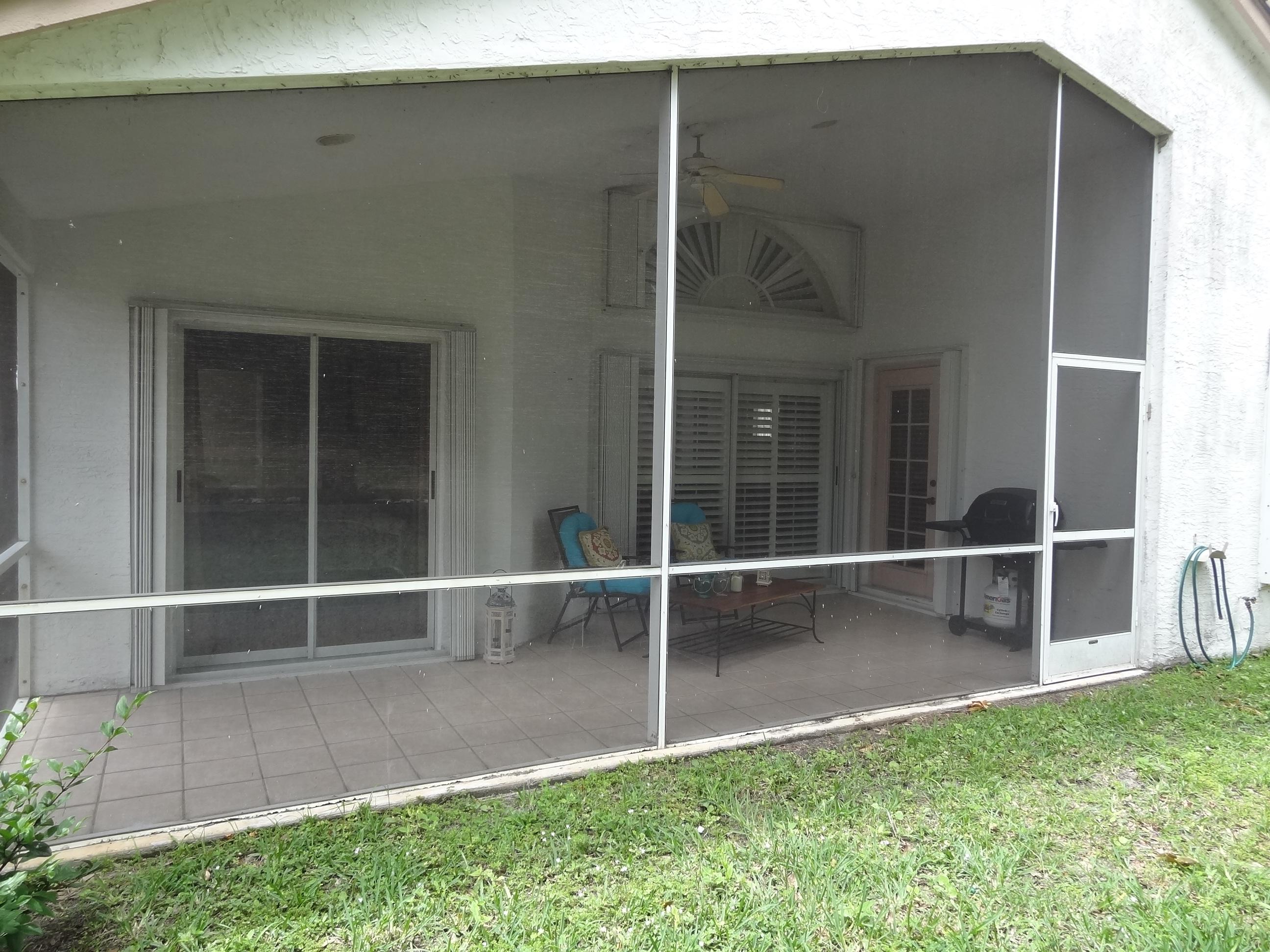 1856 Barnstable Road Wellington, FL 33414 - Photo 14 of 15 Screened Porch