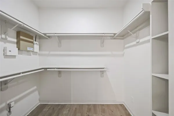 a view of an empty walk in closet