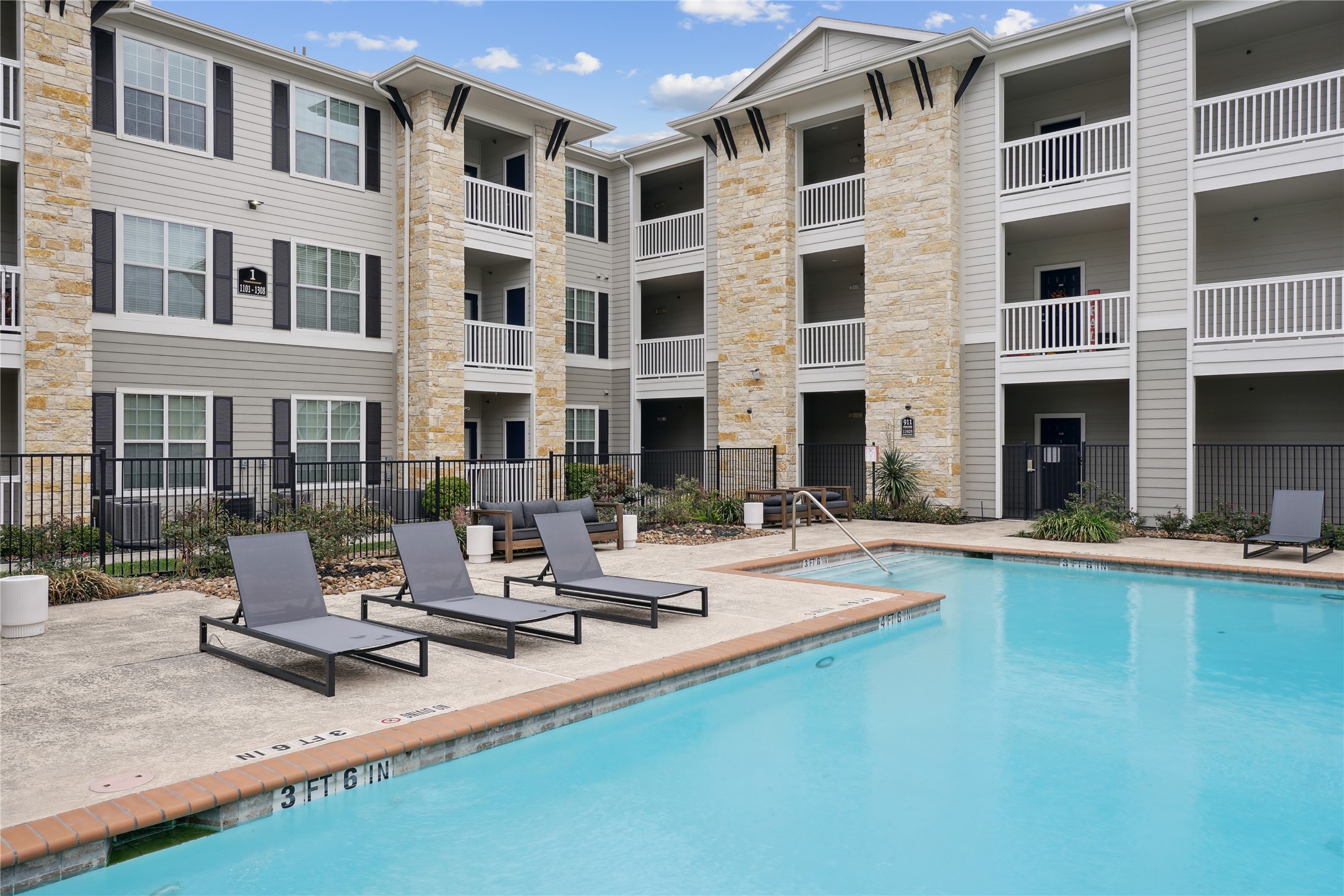 11925 Jones Road, Unit 2106 Houston, TX 77070 - Photo 2 of 21 a view of pool with outdoor seating