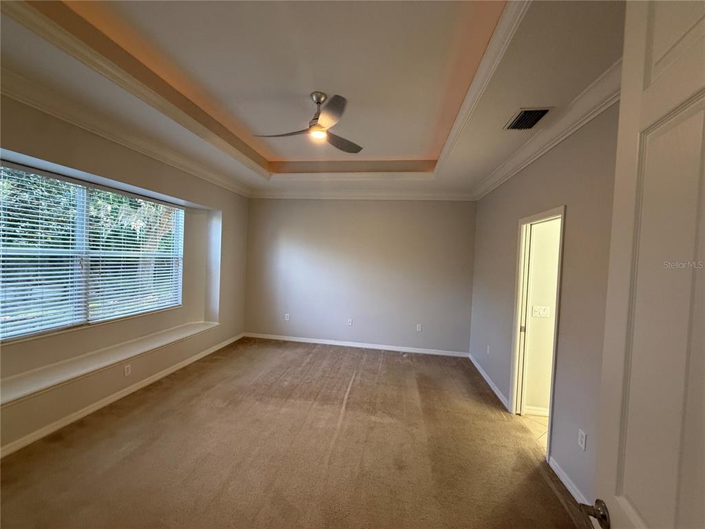 6055 Wingspan Way Bradenton, FL 34203 - Photo 15 of 32 a view of an empty room with a window