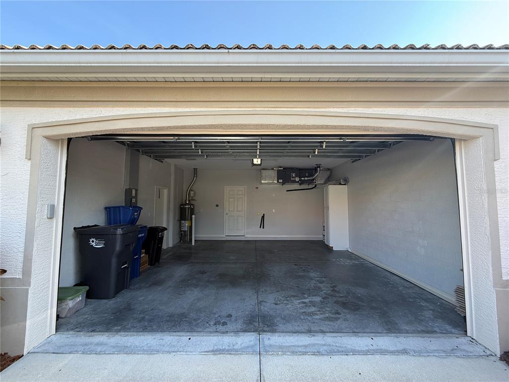6055 Wingspan Way Bradenton, FL 34203 - Photo 29 of 32 a view of a utility room with a bench
