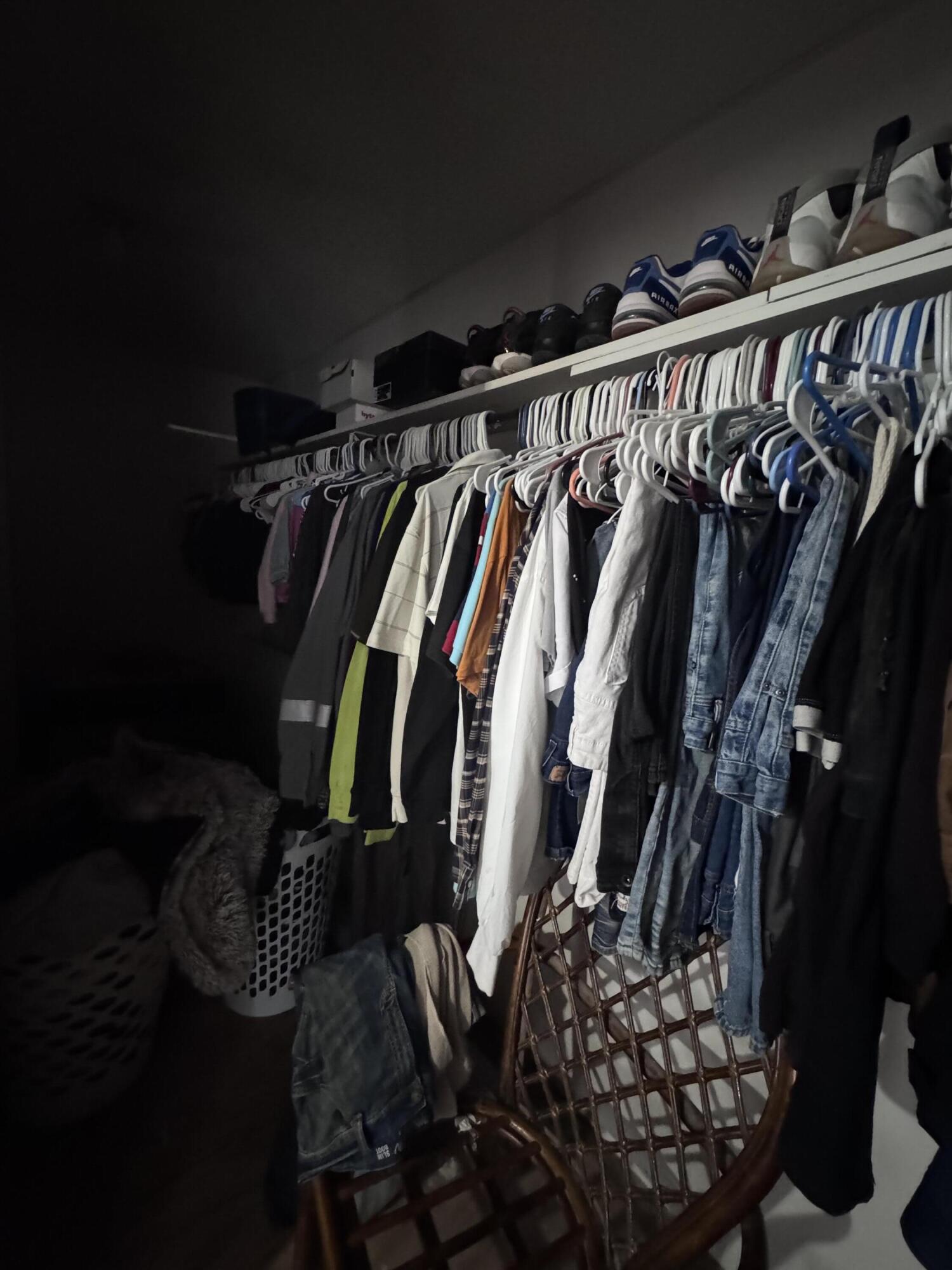 1401 South Canyon Avenue Lamesa, TX 79331 - Photo 28 of 32 a view of walk in closet with clothes and shoes