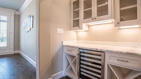 a view of a kitchen with a sink