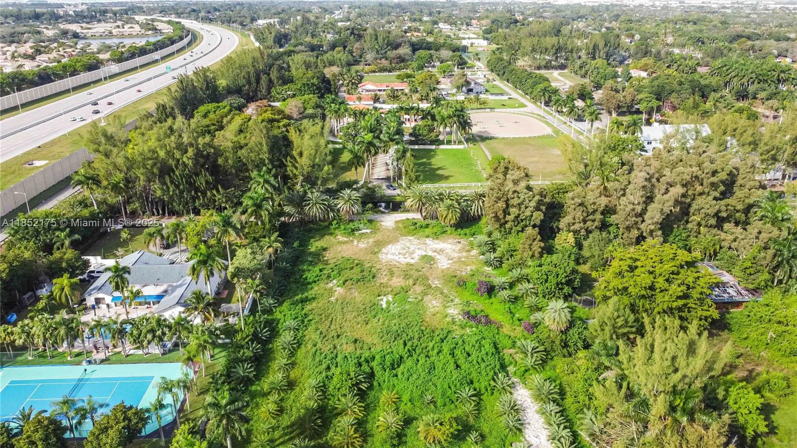 4001 Southwest 126th Avenue Miramar, FL 33027 - Photo 3 of 16 an aerial view of residential houses with outdoor space and trees