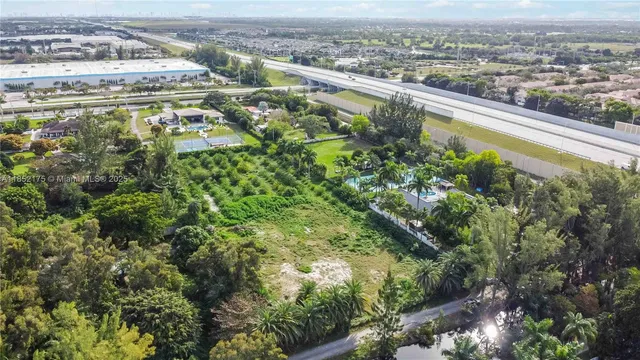 an aerial view of residential building with parking space