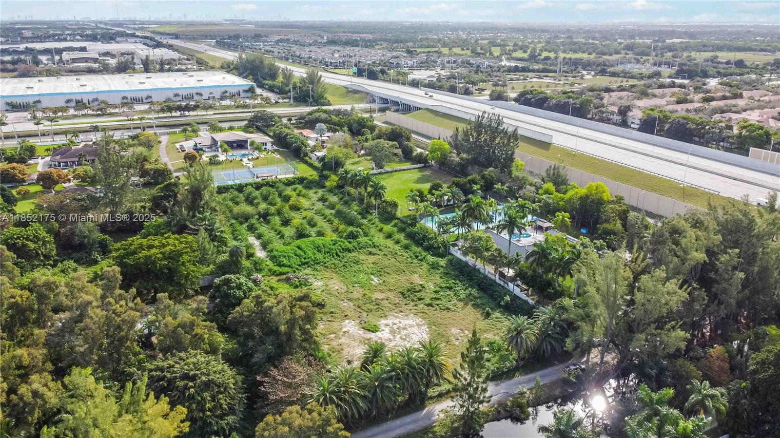 4001 Southwest 126th Avenue Miramar, FL 33027 - Photo 8 of 16 an aerial view of residential building with parking space