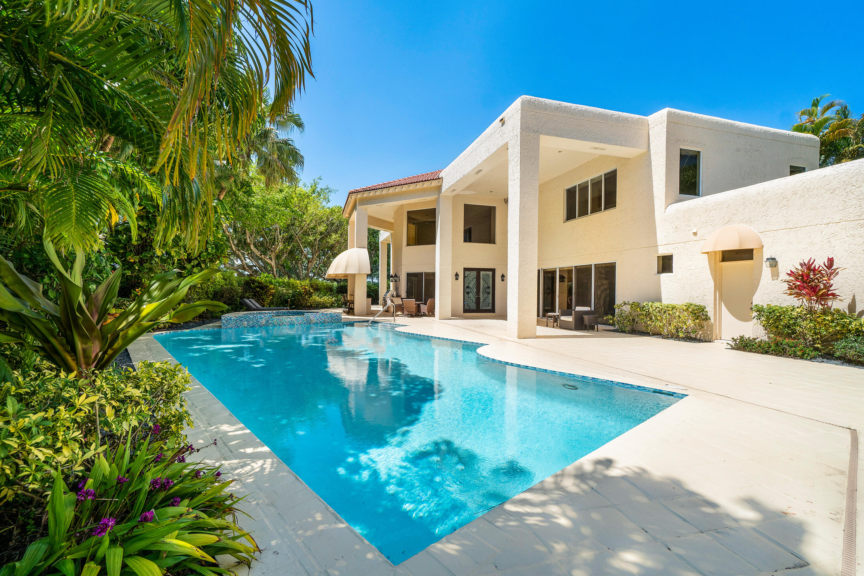 17046 Royal Cove Way Boca Raton, FL 33496 - Photo 1 of 55 a view of a house with swimming pool
