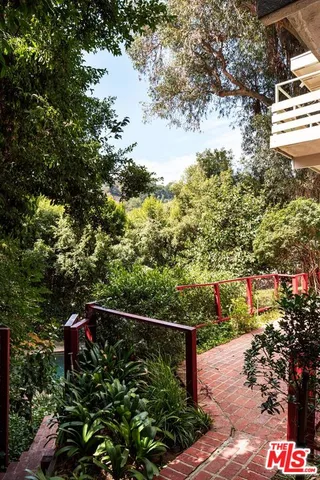 a view of a balcony with an outdoor space