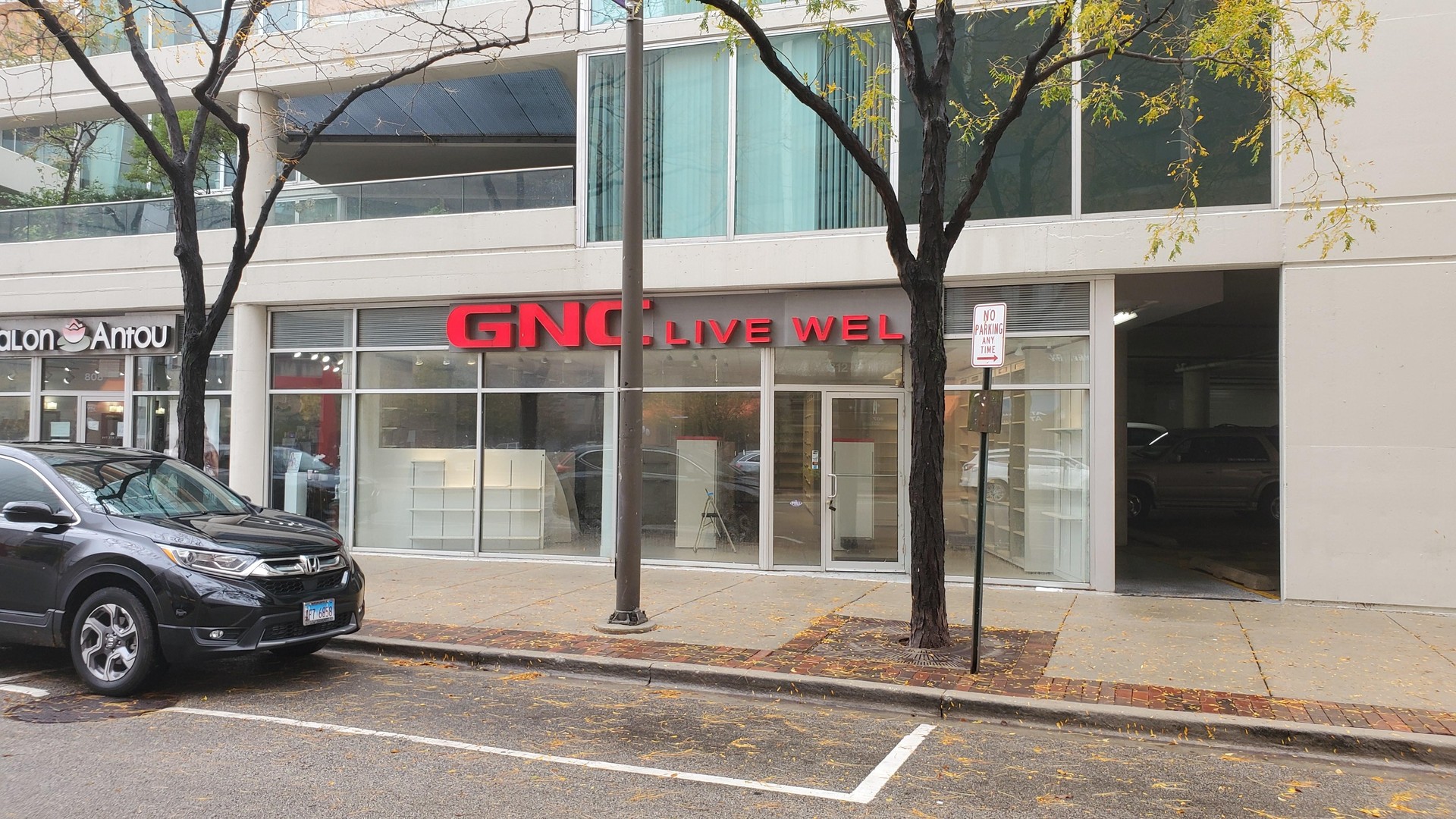 812 Davis Street Evanston, IL 60201 - Photo 3 of 14 a view of a car park in front of a house
