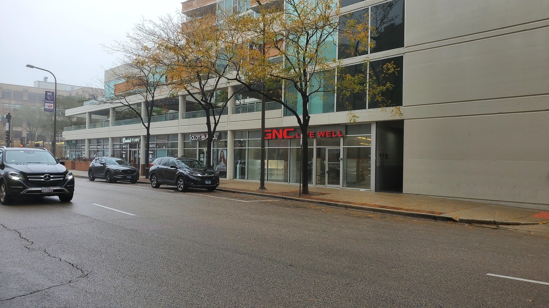 812 Davis Street Evanston, IL 60201 - Photo 7 of 14 a view of car parked in front of house