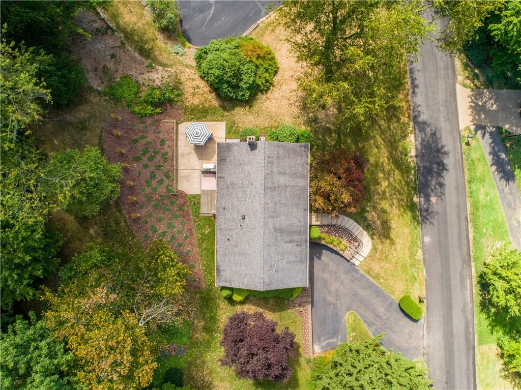 8 Thornridge Road Pittsburgh, PA 15202 - Photo 18 of 18 Aerial view, showing the extra car parking pad, the beautiful landscape design, and the expansive outdoor living space of 8 Thornridge Road! Come see all this home has to offer!