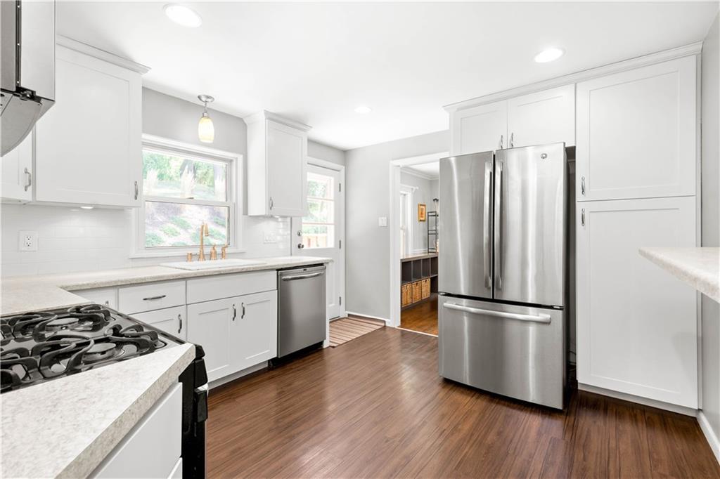 8 Thornridge Road Pittsburgh, PA 15202 - Photo 6 of 18 Bright white cabinets are accentuated by the stainless steel appliances.