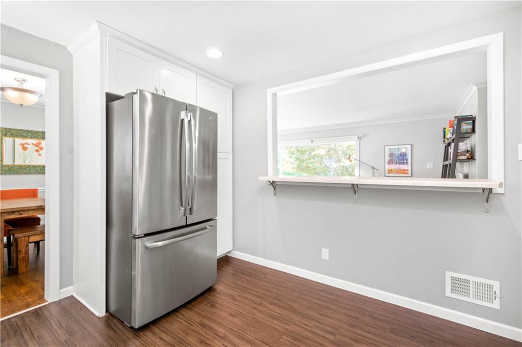 8 Thornridge Road Pittsburgh, PA 15202 - Photo 8 of 18 The breakfast bar space opens up to the living room and its gorgeous picture window. Newer (2017) GE French door refrigerator and huge pantry.