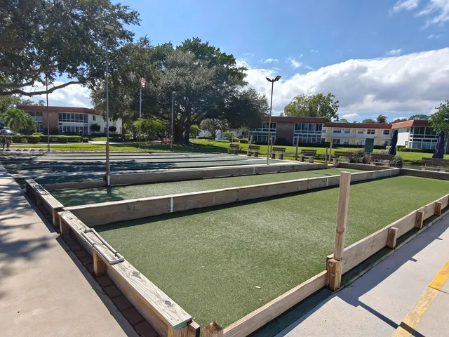 a view of swimming pool with a yard