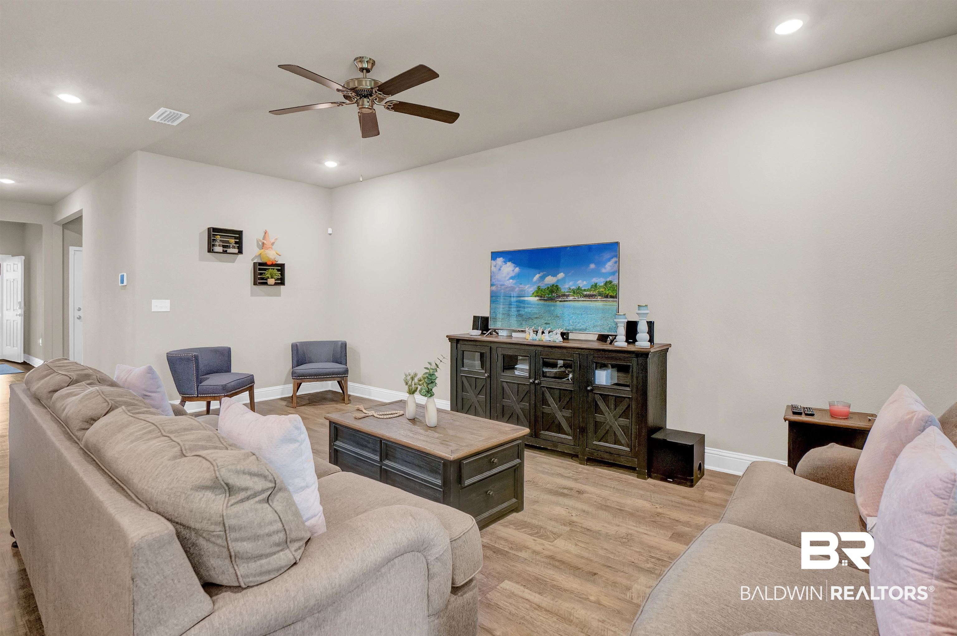 31671 Memphis Loop Daphne, AL 36527 - Photo 18 of 51 Living room with visible vents, recessed lighting, a ceiling fan, and light wood finished floors