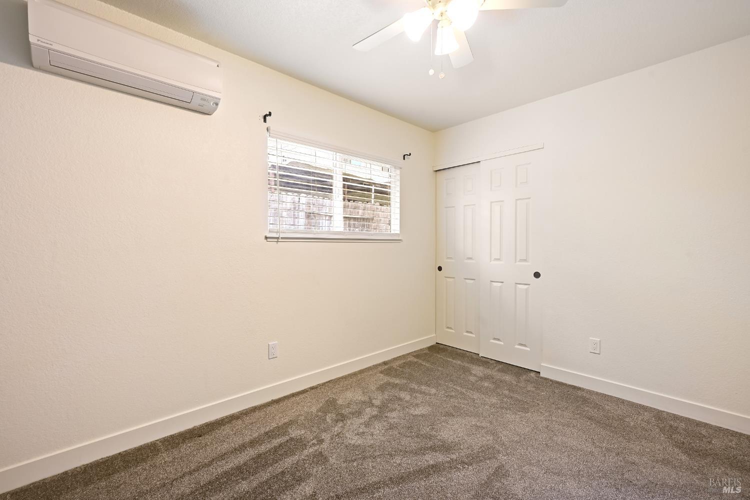 1536 Marlow Road Santa Rosa, CA 95401 - Photo 14 of 21 an empty room with a window