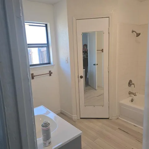 a bathroom with a bathtub