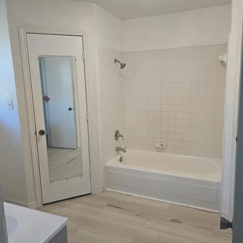 a utility room with a sink dryer and washer