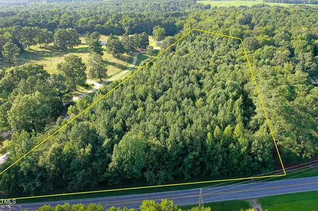 a view of a yard with an outdoor space