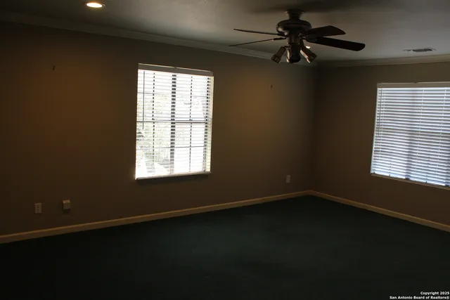a bathroom with a shower and mirror
