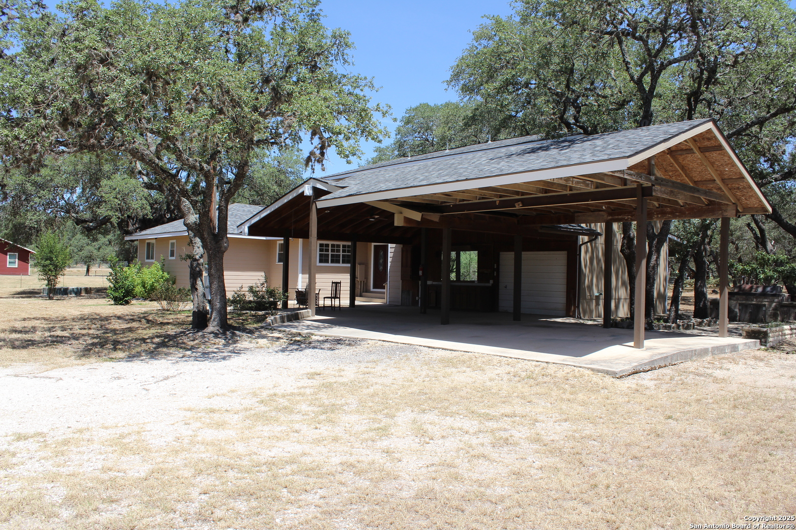 24590 Trumbo Road San Antonio, TX 78264 - Photo 2 of 34 a view of a house with a outdoor space