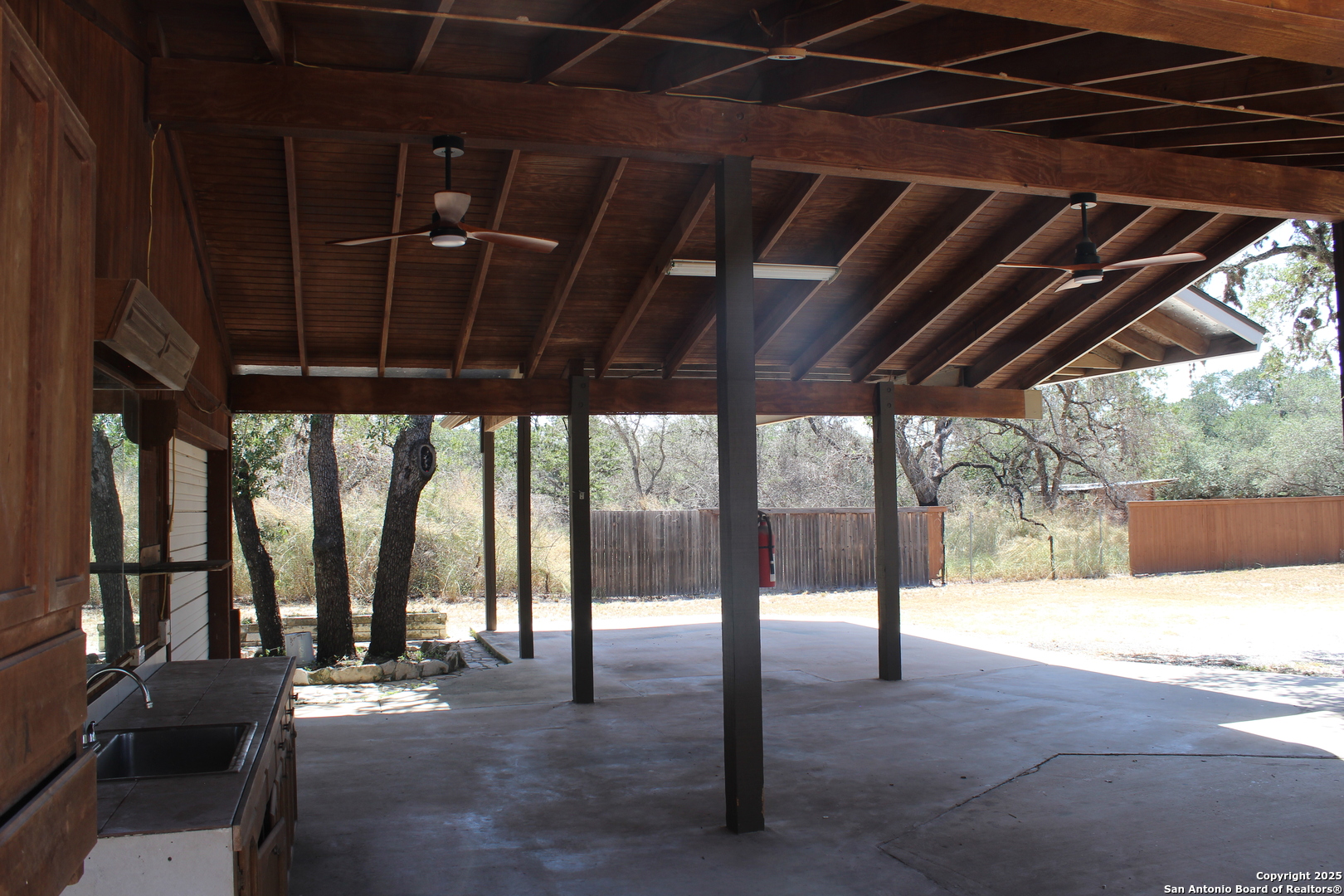 24590 Trumbo Road San Antonio, TX 78264 - Photo 33 of 34 a view of a porch with furniture