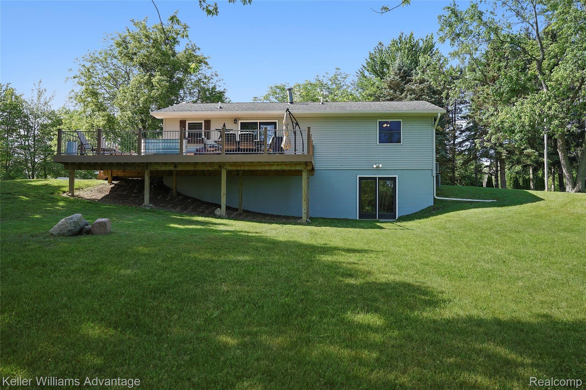 944 Chase Lake Road Howell, MI 48855 - Photo 3 of 36 Completely remodeled, immaculate 3-bedroom ranch on 3.21 acres with pole barn. Walkout lower level, and extensive deck (low-maintenance composite decking). Move-in ready!